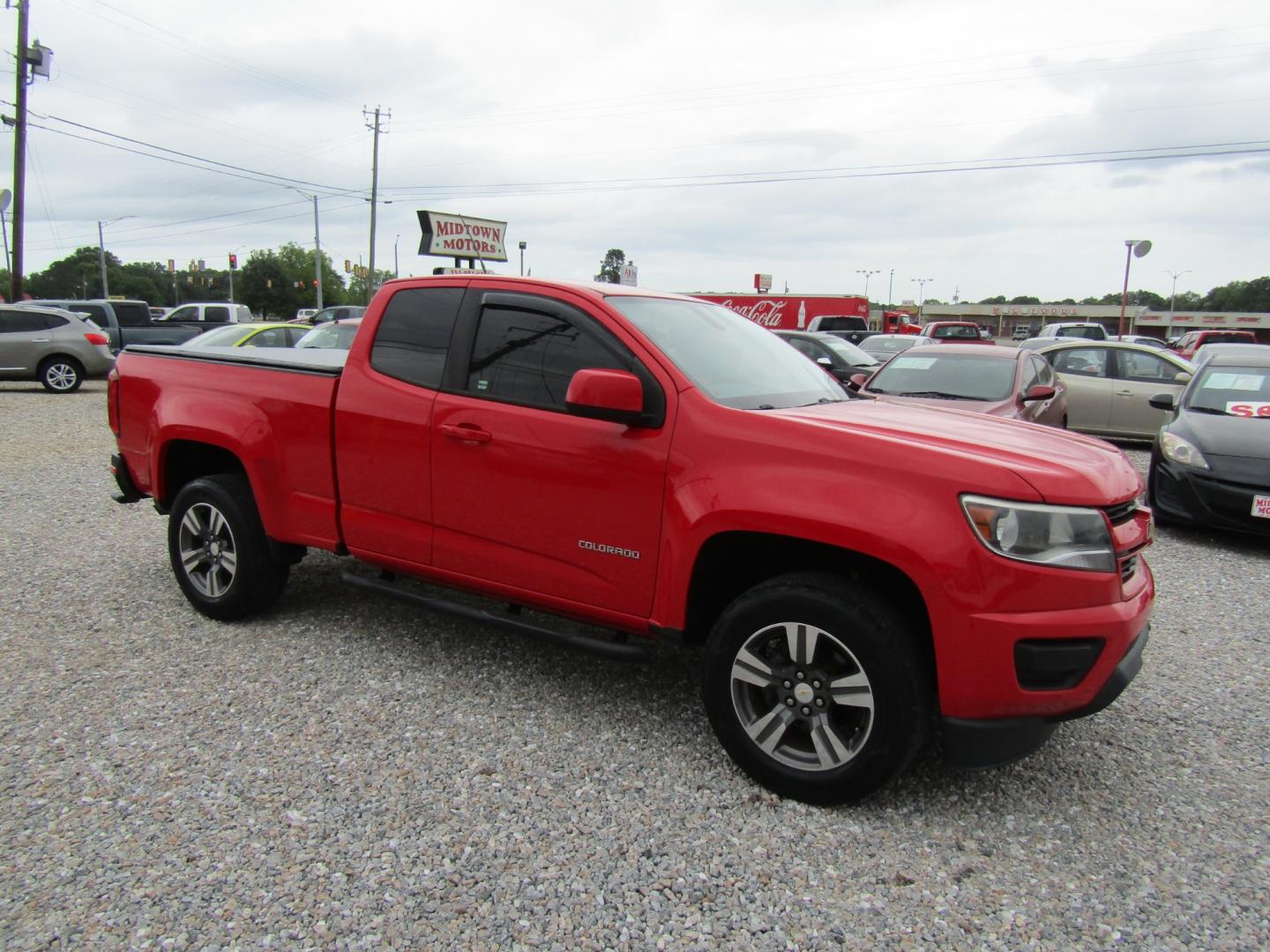 2017 Red /Gray Chevrolet Colorado Work Truck Ext. Cab 2WD (1GCHSBEA0H1) with an 2.5L L4 DOHC 16V GAS engine, 6A transmission, located at 15016 S Hwy 231, Midland City, AL, 36350, (334) 983-3001, 31.306210, -85.495277 - Photo#0